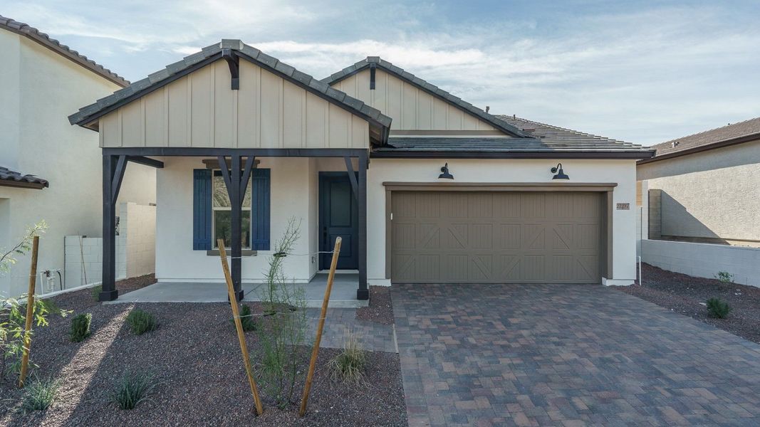 Representative exterior photo of a completed home built from the Saguaro by William Ryan Homes in The Ridge at Sienna Hills, Buckeye, AZ (Image 21). Representative exterior photo of a completed home built from the Saguaro by William Ryan Homes in The Ridge at Sienna Hills, Buckeye, AZ (Image 21).