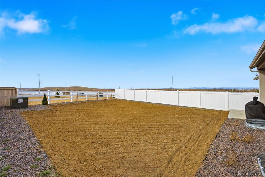 Exterior details and patio area of a home in Harvest Ridge, Aurora (Image 30).