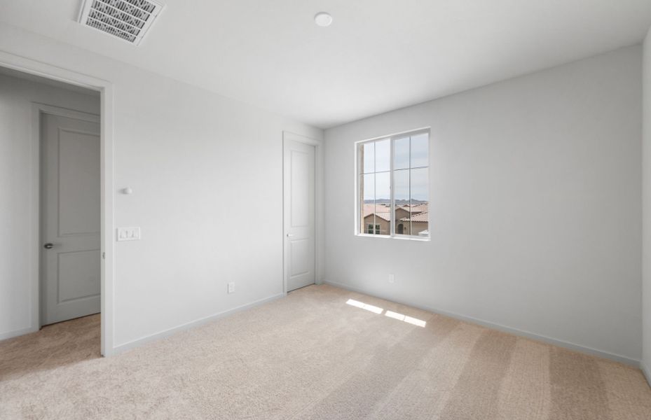 Spacious, unfurnished interior of a new home in Legado West, Queen Creek (Image 20).