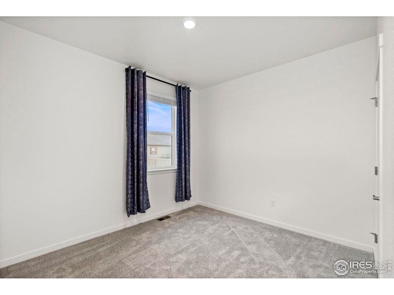 Spacious, unfurnished interior of a new home in Vantage, Berthoud (Image 25).