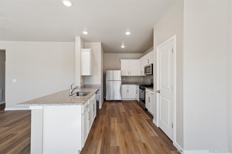 Furnished interior view inside a new home in Cottonwood Greens, Fort Lupton (Image 7).