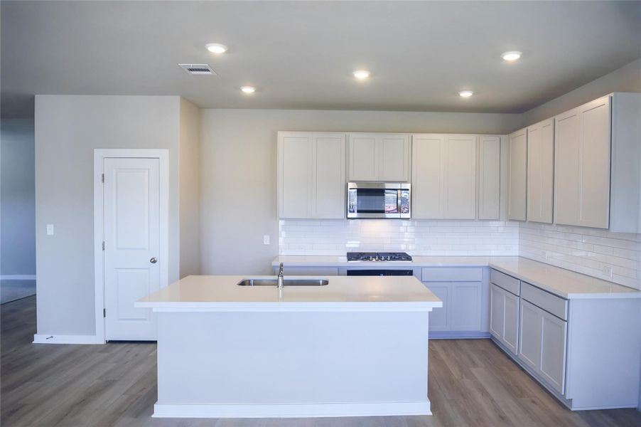 Light & Bright Open Concept Kitchen with center island