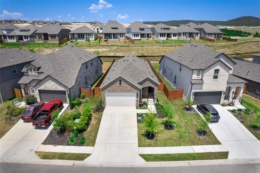 Front exterior of a new home in , Lago Vista, TX, highlighting curb appeal (Image 2). Front exterior of a new home in , Lago Vista, TX, highlighting curb appeal (Image 2).