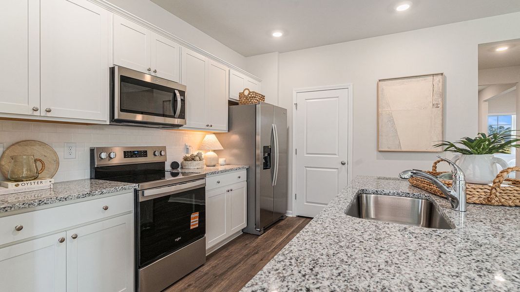 Furnished interior view inside a new home in The Reserve at Wild Horse, Conway (Image 6).