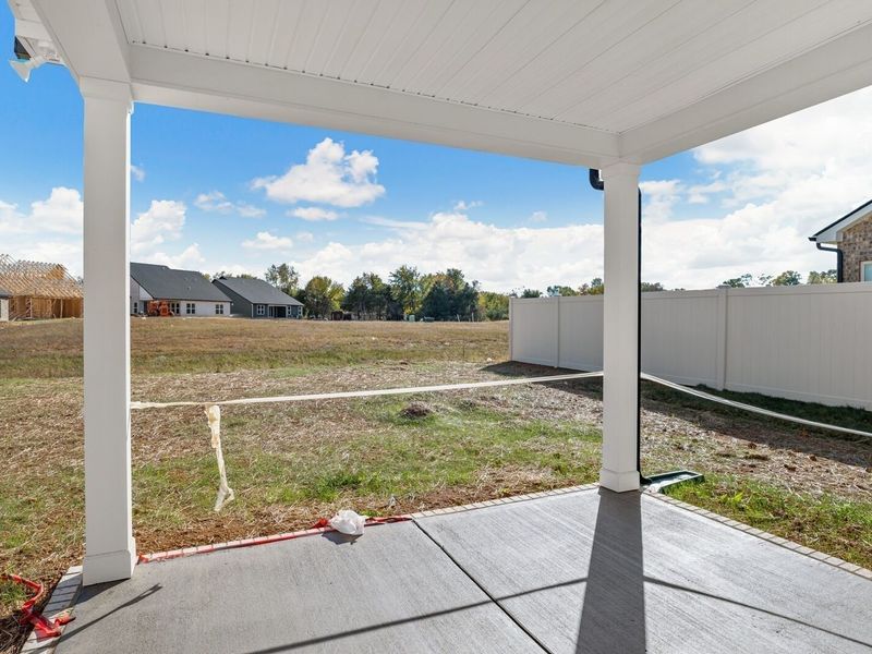 Exterior details and patio area of a home in Woods Crossing, Gallatin (Image 3).