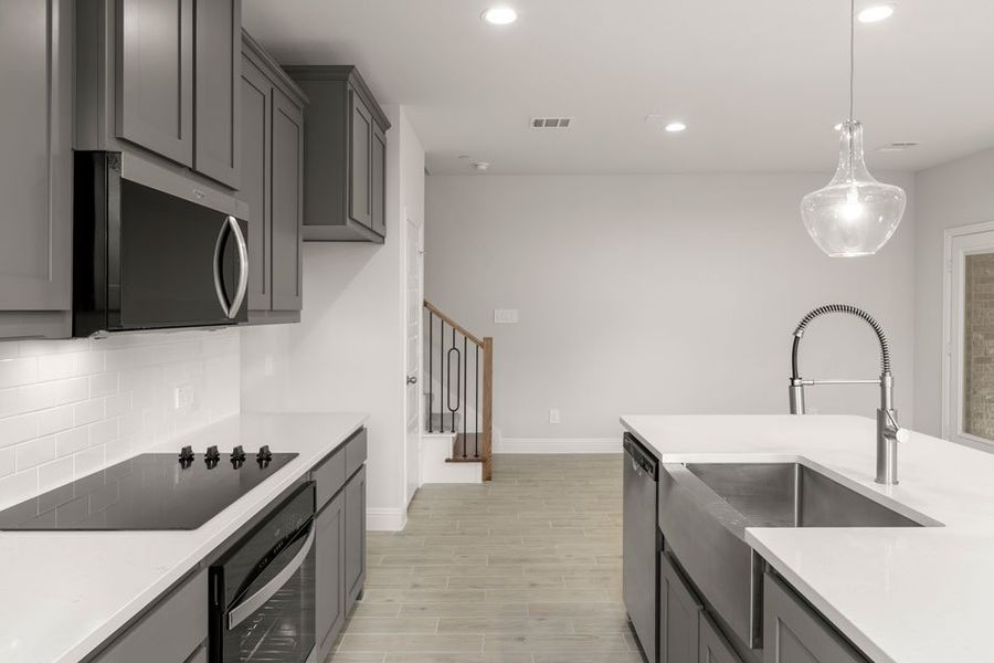 Representative exterior photo of a completed home built from the Opal by Impression Homes in Sereno Oaks at Buckner Terrace, Dallas, TX (Image 12). Representative exterior photo of a completed home built from the Opal by Impression Homes in Sereno Oaks at Buckner Terrace, Dallas, TX (Image 12).