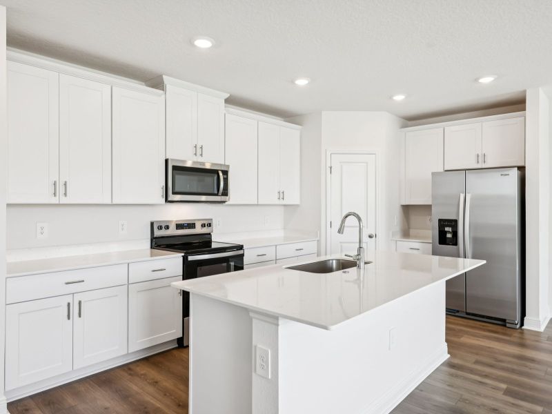 Furnished interior view inside a new home in The Reserve at Hammock Oaks - Signature Series, Lady Lake (Image 4).
