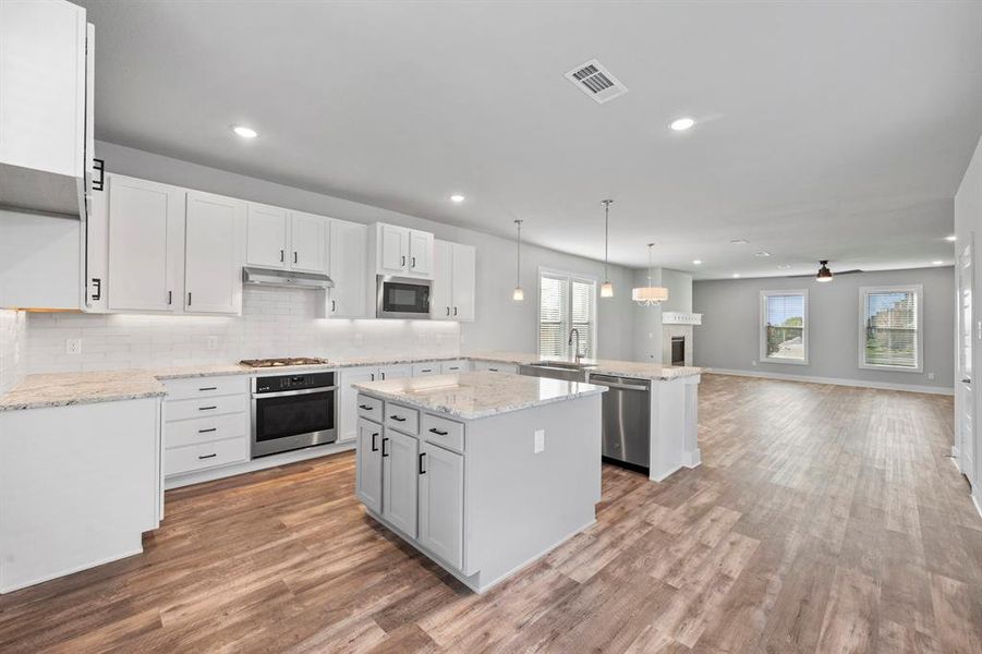 Furnished interior view inside a new home in Heritage Towne, Grand Prairie (Image 4).