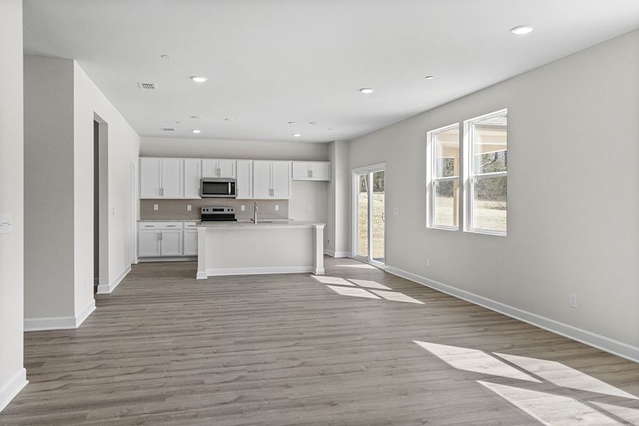 A large empty kitchen. A large empty kitchen.