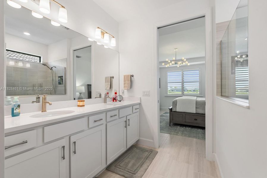 Furnished interior view inside a new home in Del Webb Naples, Ave Maria (Image 23).