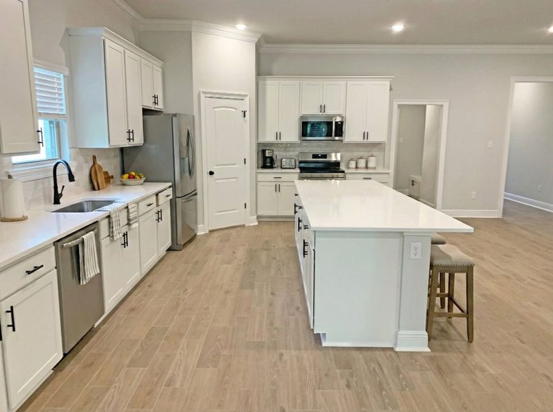 Furnished interior view inside a new home in Sentinel Ridge, Pace (Image 4).