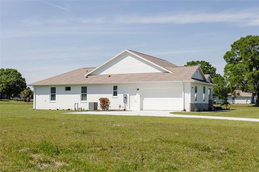 Front exterior of a new home in , Ocala, FL, highlighting curb appeal (Image 25).