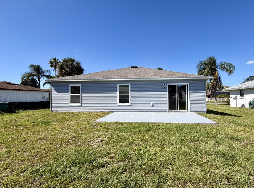 Exterior details and patio area of a home in Poinciana, Poinciana (Image 2).