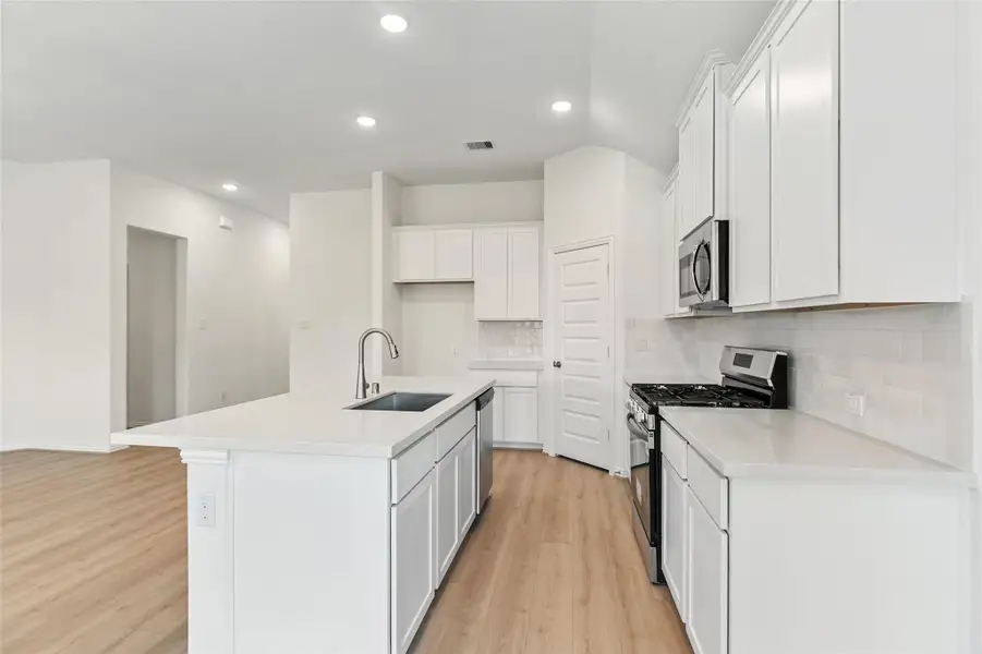 Furnished interior view inside a new home in Oakwood Estates, Waller (Image 9).