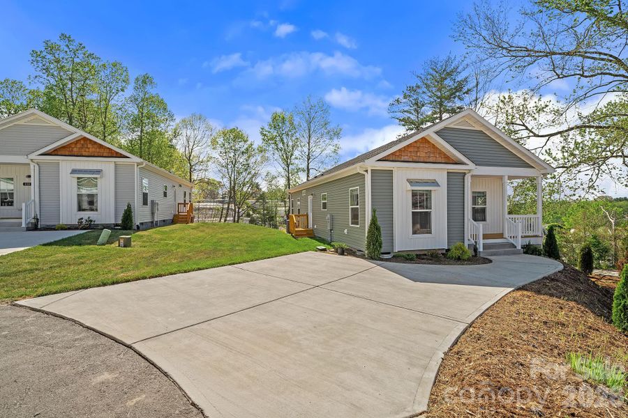 Front exterior of a new home in , Asheville, NC, highlighting curb appeal (Image 24).