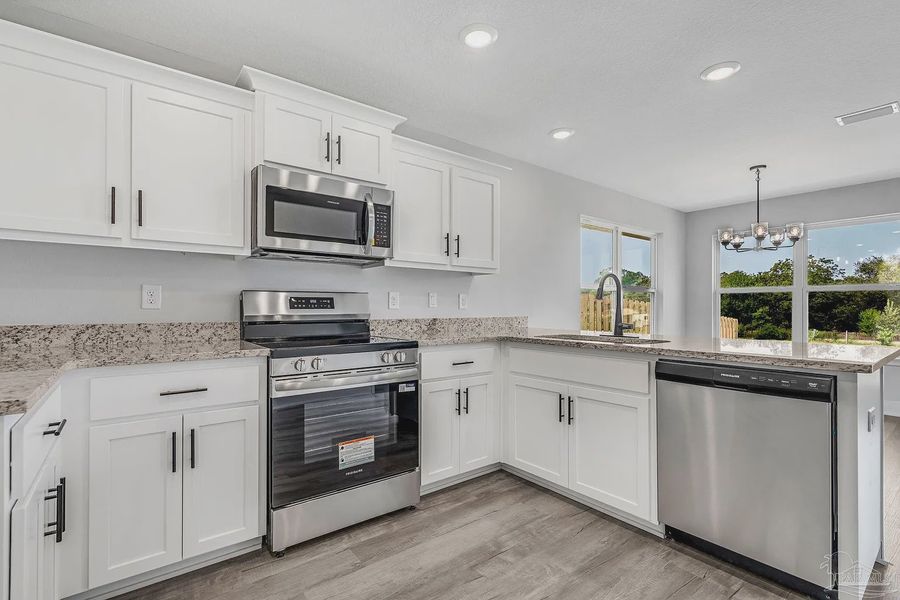 Furnished interior view inside a new home in Allison Acres, Cantonment (Image 9).