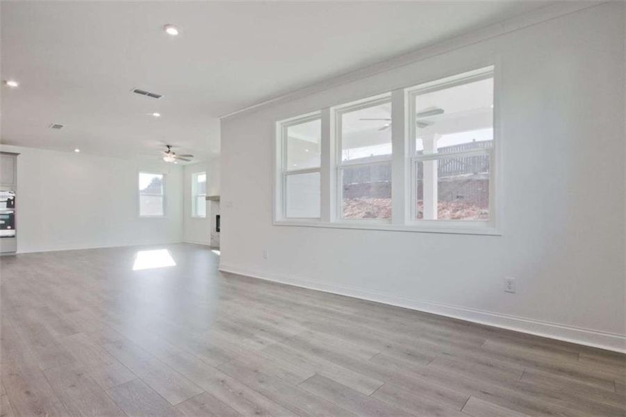 Spacious, unfurnished interior of a new home in The Paddocks at Doc Hughes, Buford (Image 38).