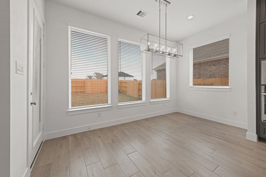 Representative unfurnished interior of a home built from the Rollins by Chesmar Homes in Gregg Ranch, Marble Falls (Image 8).