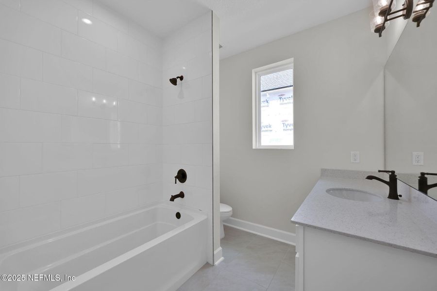 Furnished interior view inside a new home in Trailmark - Phase 6, St. Augustine (Image 17).