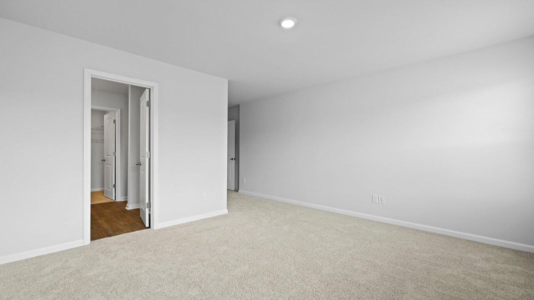 Spacious, unfurnished interior of a new home in Pine Hills Townhomes at Cane Bay, Summerville (Image 14). Spacious, unfurnished interior of a new home in Pine Hills Townhomes at Cane Bay, Summerville (Image 14).