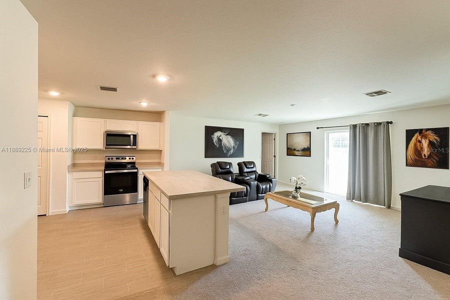 Furnished interior view inside a new home in , Lehigh Acres (Image 6). Furnished interior view inside a new home in , Lehigh Acres (Image 6).