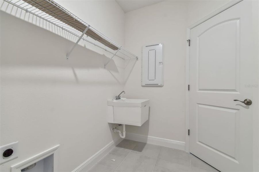 Photos are not the home listed, but same floor plan.