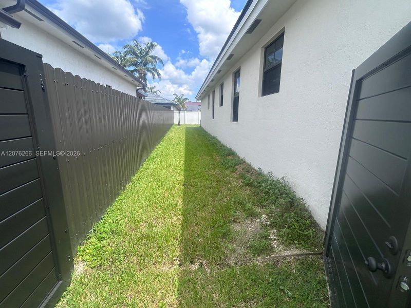 Exterior details and patio area of a home in , Miami (Image 3). Exterior details and patio area of a home in , Miami (Image 3).