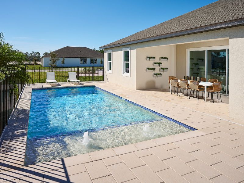Exterior details and patio area of a home in Ridgehaven - Reserve Series, Ormond Beach (Image 1). Exterior details and patio area of a home in Ridgehaven - Reserve Series, Ormond Beach (Image 1).
