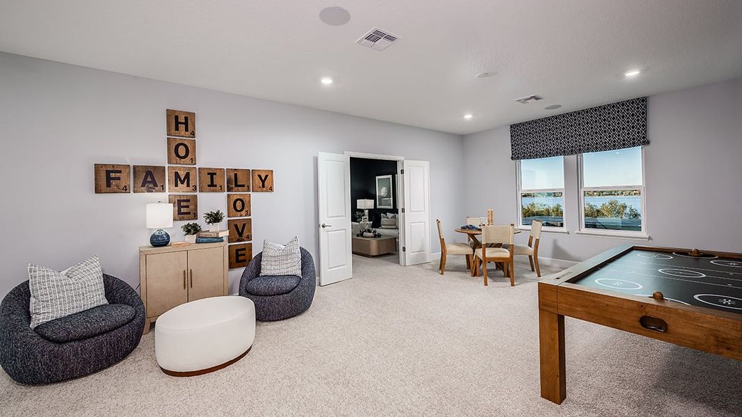 Furnished interior view inside a new home in Lochside, Mount Dora (Image 21). Furnished interior view inside a new home in Lochside, Mount Dora (Image 21).