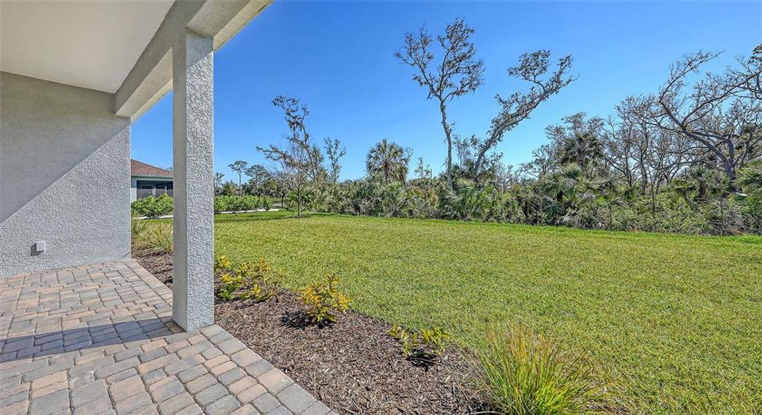 Exterior details and patio area of a home in Wildleaf, Parrish (Image 4). Exterior details and patio area of a home in Wildleaf, Parrish (Image 4).