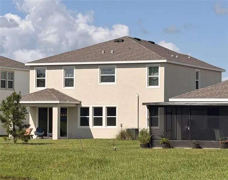 Front exterior of a new home in , San Antonio, FL, highlighting curb appeal (Image 25). Front exterior of a new home in , San Antonio, FL, highlighting curb appeal (Image 25).