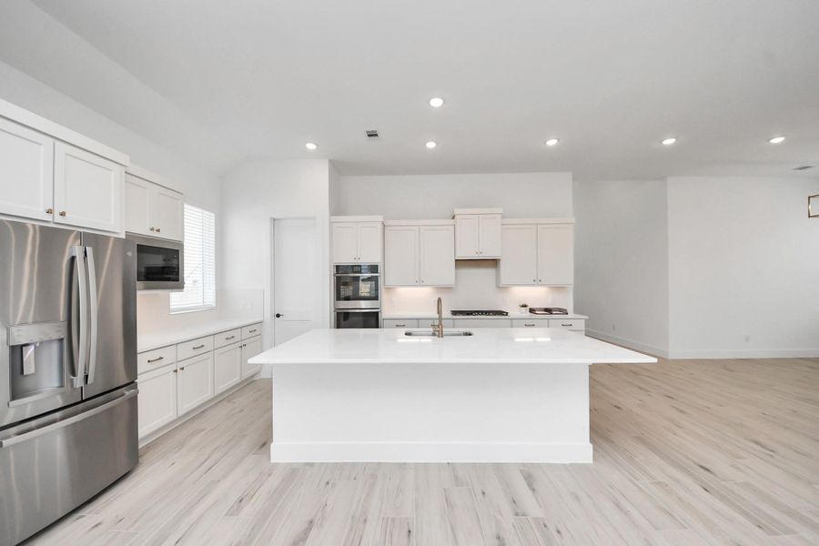 Furnished interior view inside a new home in Meridiana Courtyard Collection, Manvel (Image 8).
