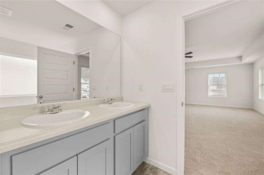 Furnished interior view inside a new home in Oakchase at Hampton, Hampton (Image 8).