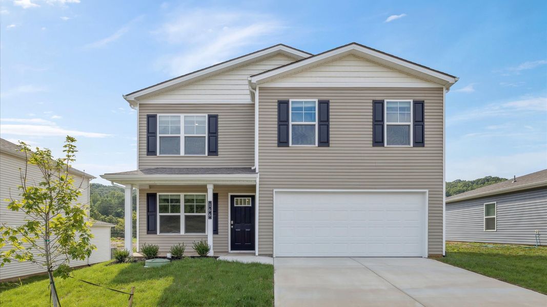 Front exterior of a new home in Emory Creek, Harriman, TN, highlighting curb appeal (Image 1).