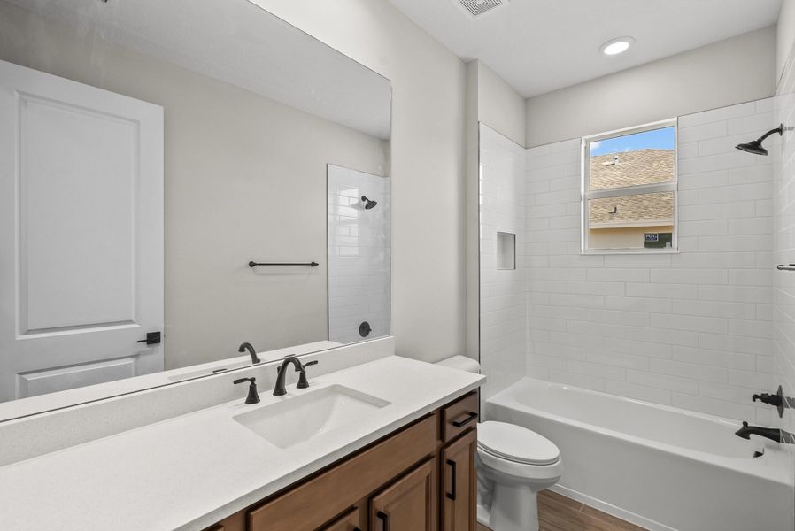 Representative furnished interior of a home built from the Weston Signature by GHO Homes in High Pointe, Vero Beach (Image 38).