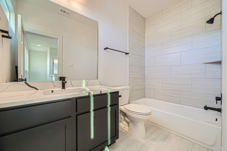 Furnished interior view inside a new home in Chester Ranch Place, Round Rock (Image 10).