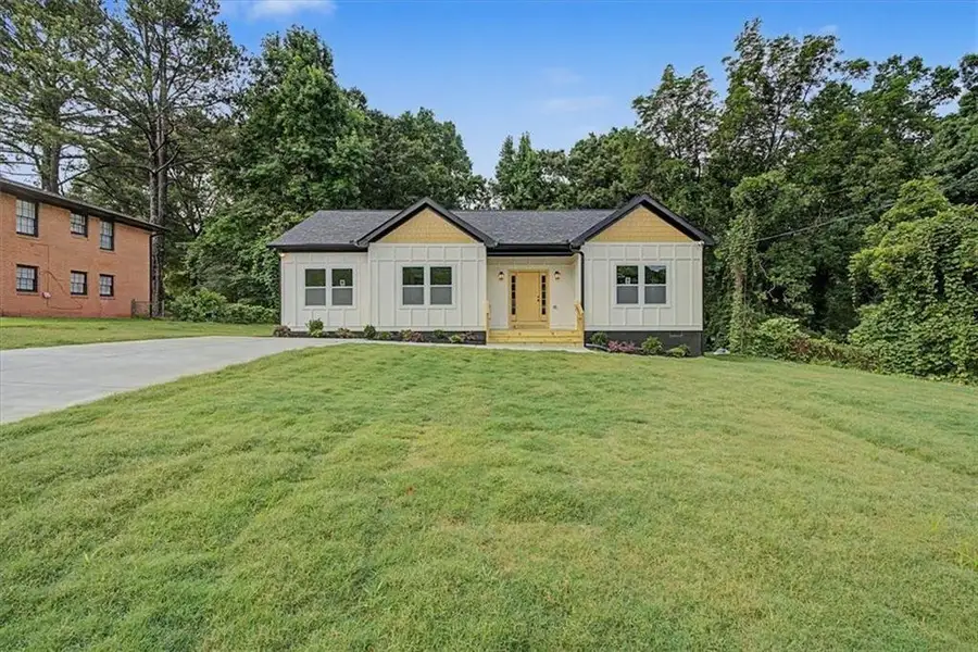 Front exterior of a new home in , Forest Park, GA, highlighting curb appeal (Image 20). Front exterior of a new home in , Forest Park, GA, highlighting curb appeal (Image 20).