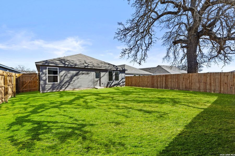 Exterior details and patio area of a home in Friendship Oaks, Fredericksburg (Image 2). Exterior details and patio area of a home in Friendship Oaks, Fredericksburg (Image 2).