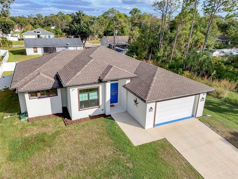 Front exterior of a new home in , North Port, FL, highlighting curb appeal (Image 23).