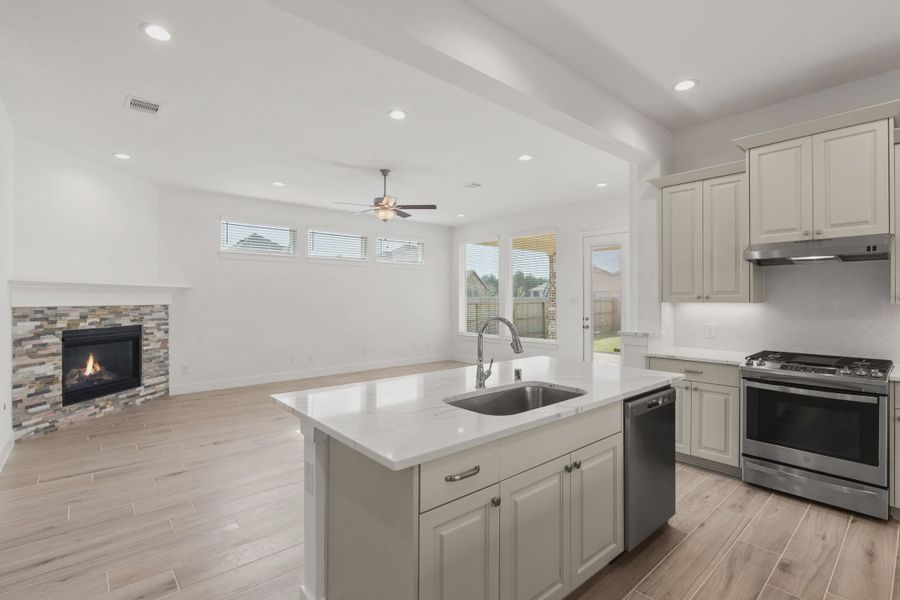 Representative furnished interior of a home built from the Macalister by Chesmar Homes in Artavia, Conroe (Image 6).