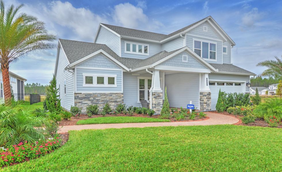 Front exterior of a new home in Middlebourne, St. Johns, FL, highlighting curb appeal (Image 2). Front exterior of a new home in Middlebourne, St. Johns, FL, highlighting curb appeal (Image 2).