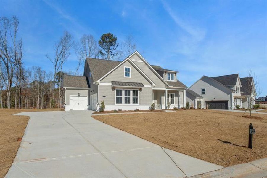 Front exterior of a new home in , Gainesville, GA, highlighting curb appeal (Image 2).