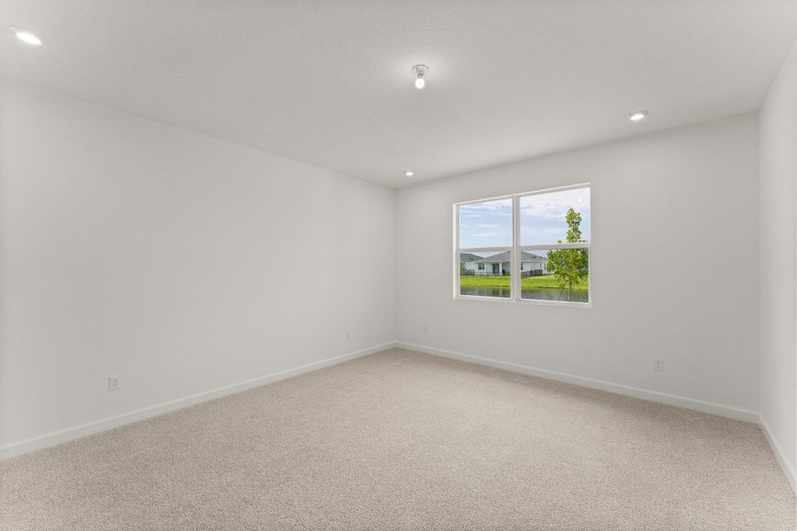 Spacious, unfurnished interior of a new home in Tradition - Cadence, Port St. Lucie (Image 8).