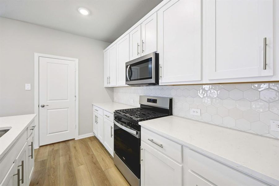 Photo is not of the actual home, but is an inspirational photo of builder’s model home and may depict options, furnishings, and/or decorator features that are not included.