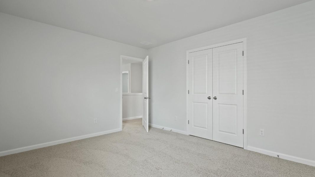Spacious, unfurnished interior of a new home in Pine Hills at Cane Bay, Summerville (Image 14).