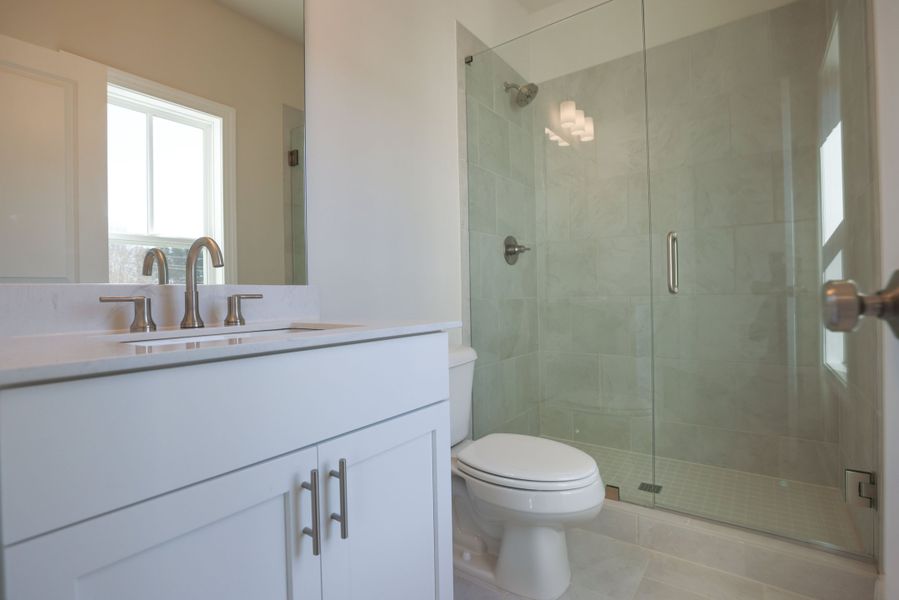 Representative furnished interior of a home built from the The Bennett by The Providence Group in Aberdeen, Hoschton (Image 14).