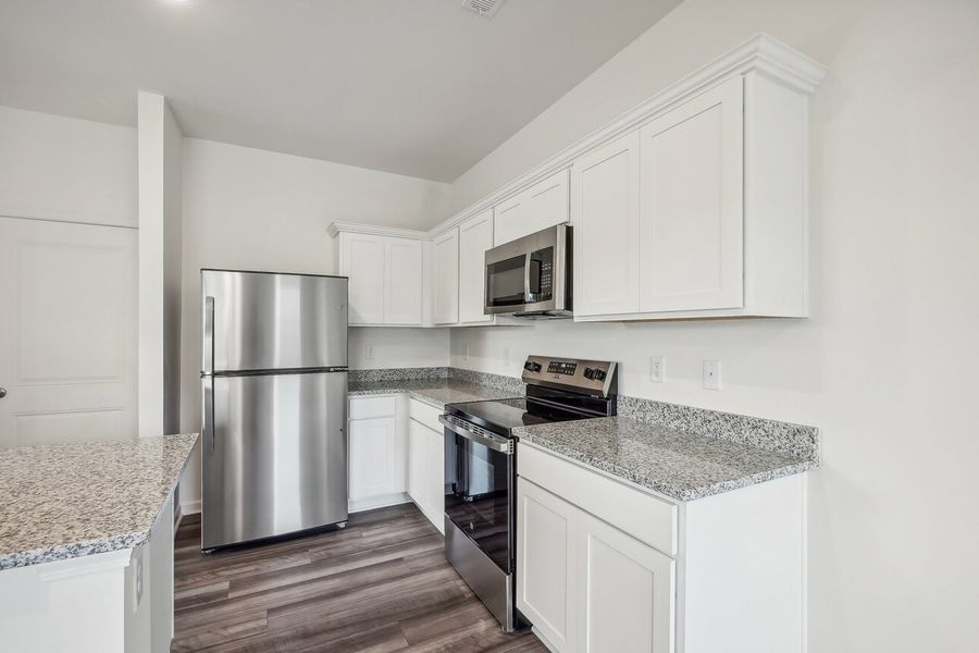 Representative furnished interior of a home built from the Dahlia by Starlight Homes in Walker Station, Wilson (Image 17).