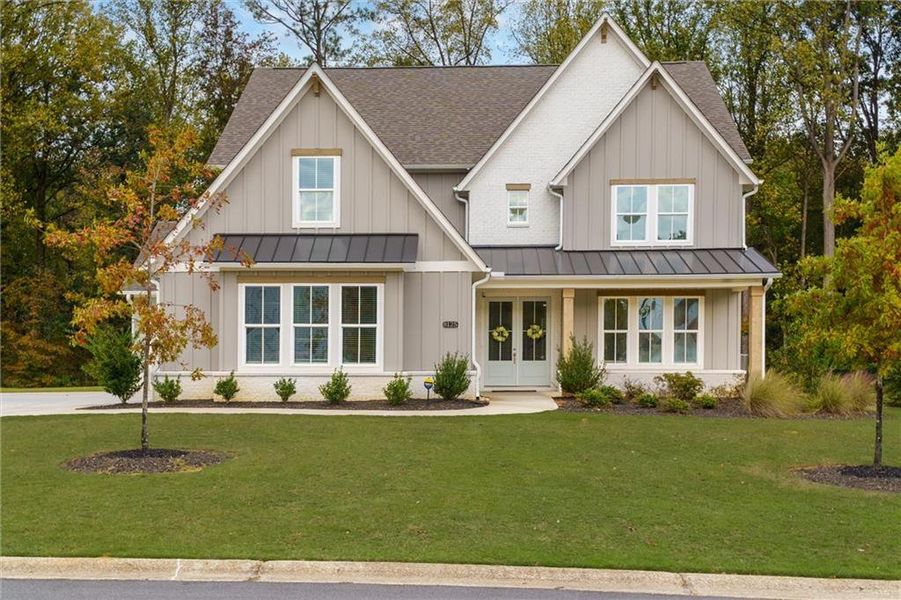 Front exterior of a new home in Fireside Farms, Gainesville, GA, highlighting curb appeal (Image 27).
