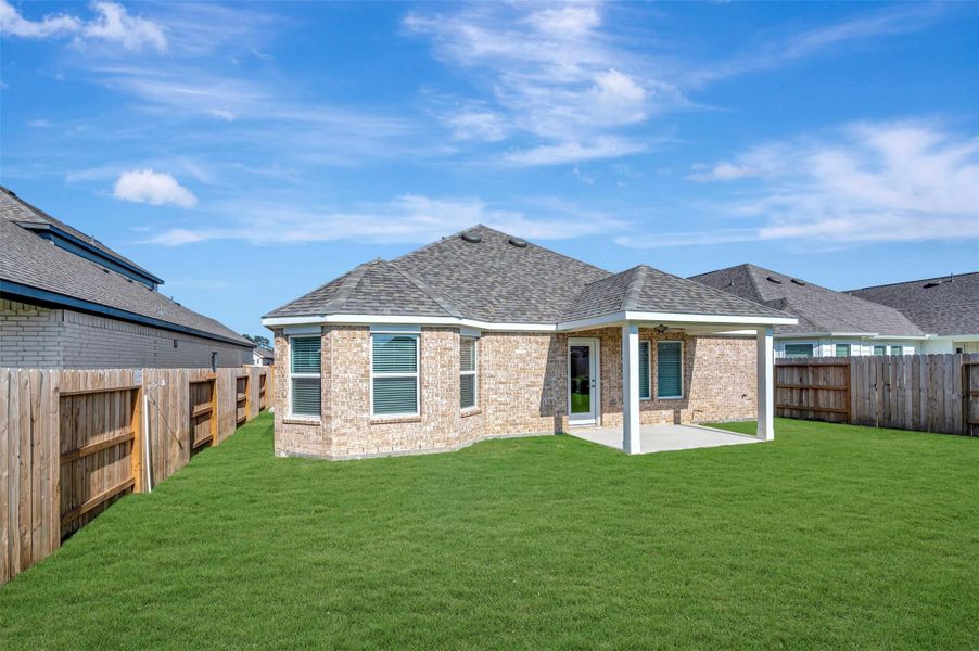 Exterior details and patio area of a home in Sorella, Tomball (Image 26).