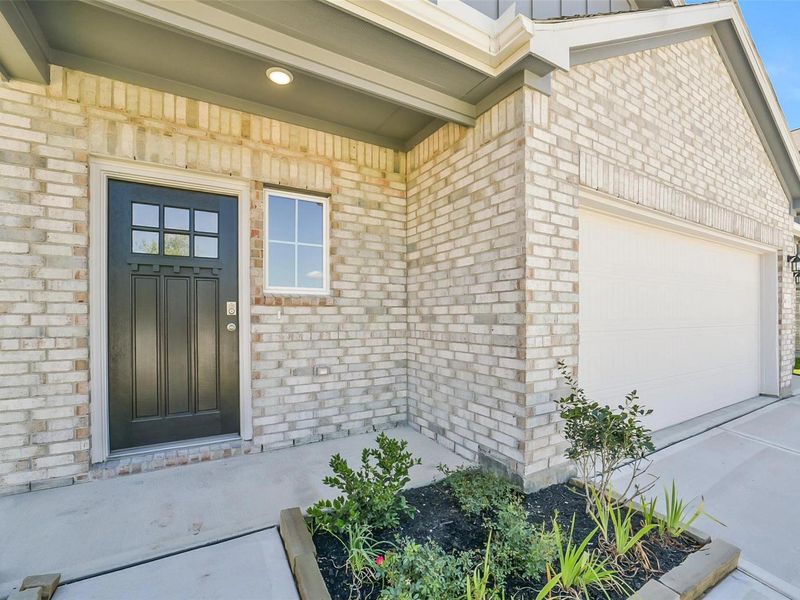 Exterior details and patio area of a home in Windmill Estates, Magnolia (Image 4). Exterior details and patio area of a home in Windmill Estates, Magnolia (Image 4).